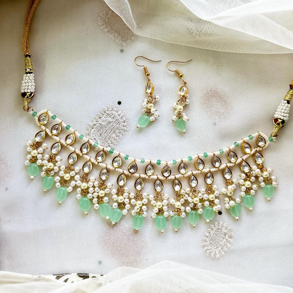 Tear drop polki kundan delicate pastel green beaded choker set