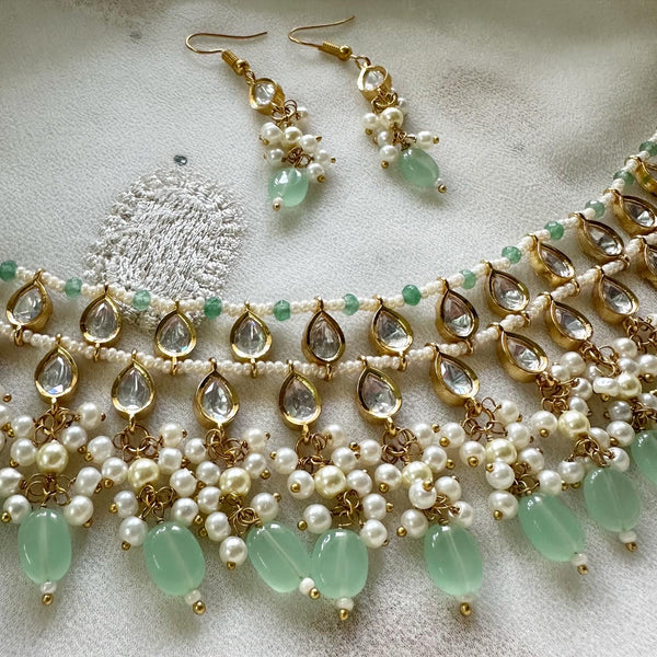 Tear drop polki kundan delicate pastel green beaded choker set
