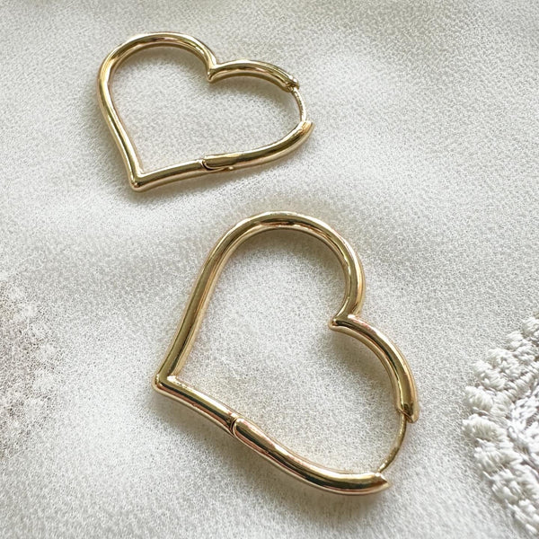 Heart hoop style earrings