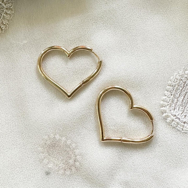 Heart hoop style earrings