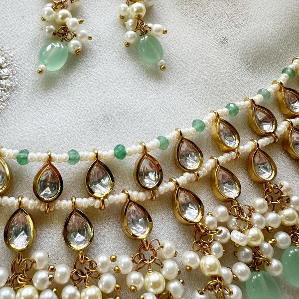Tear drop polki kundan delicate pastel green beaded choker set