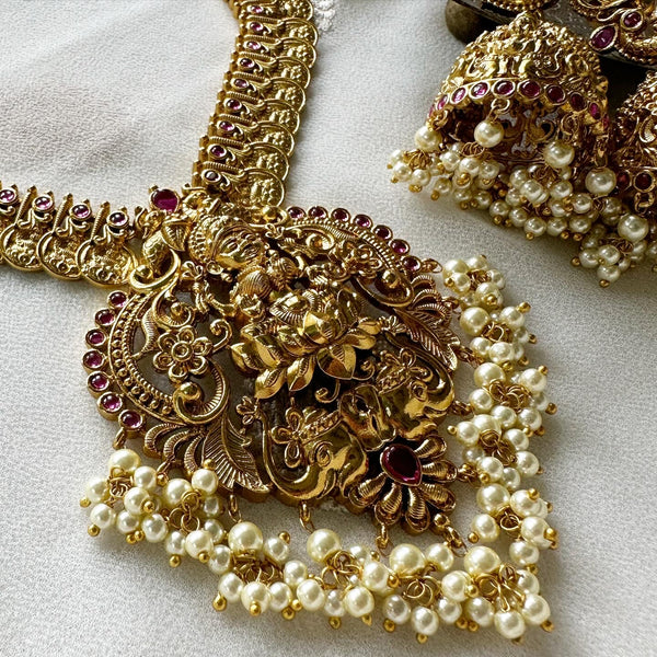 Antique matte Kemp studded Lakshmi coin spike short haaram set