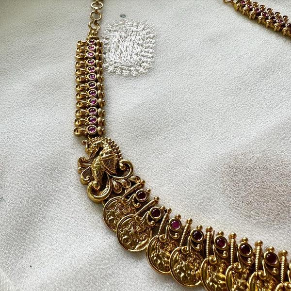 Antique matte Kemp studded Lakshmi coin spike short haaram set