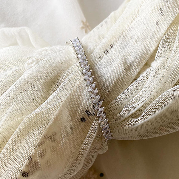 Silver CZ slant row bracelet - Adorna