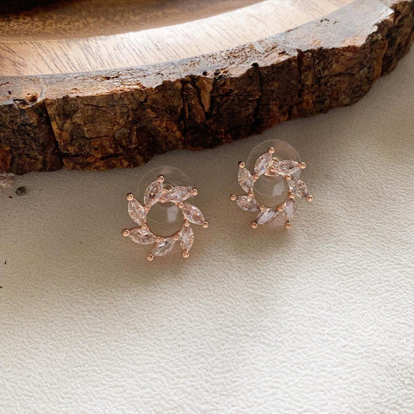 Rose gold Swirl flower studs - Adorna