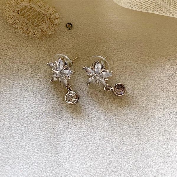 Silver flower drop studs - Adorna
