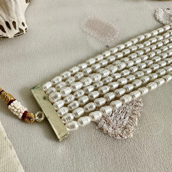 Beaten pearl criss cross choker