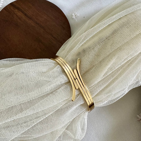 Gold Curvy routes bracelet