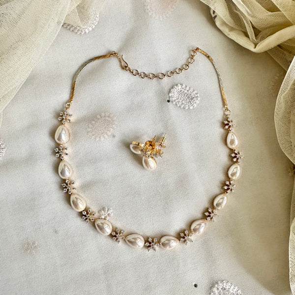 Shiny tear drop pearl CZ flower short set