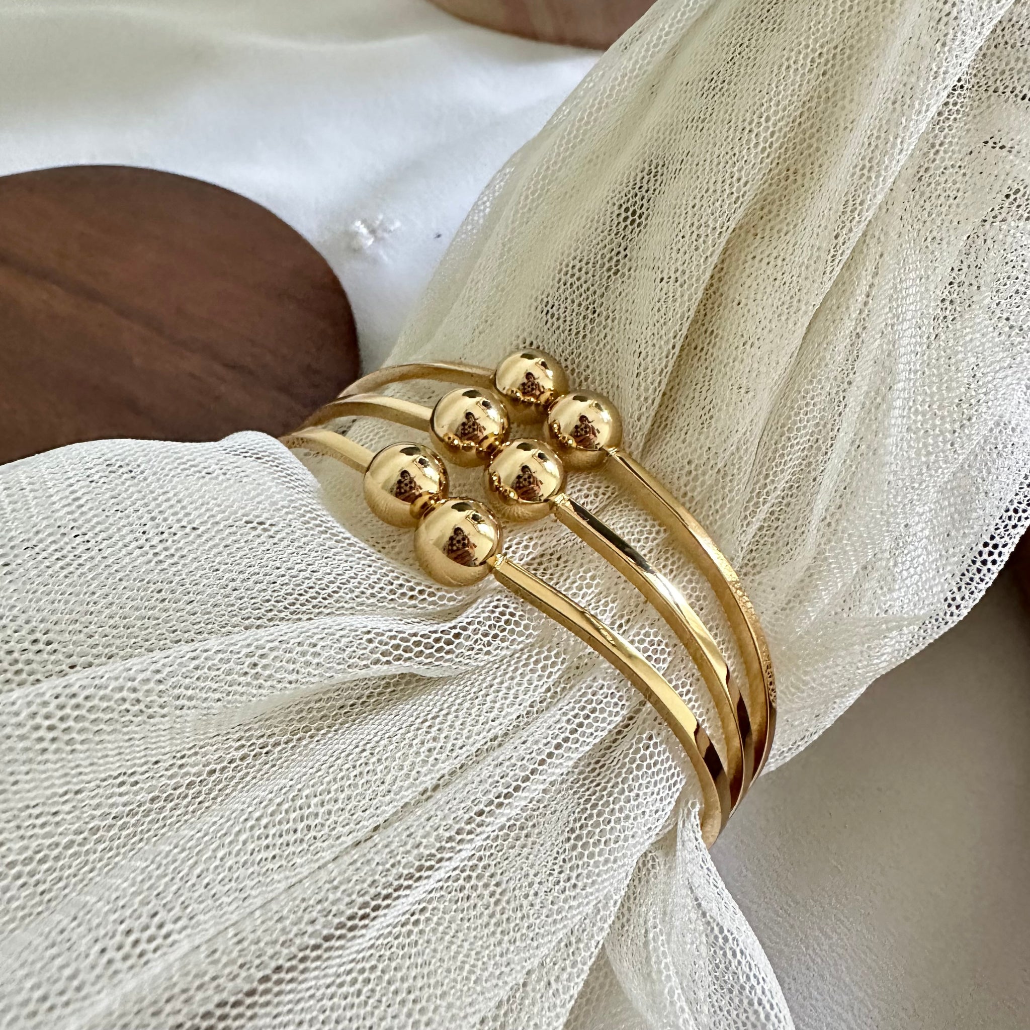 Gold Meeting spheres bracelet