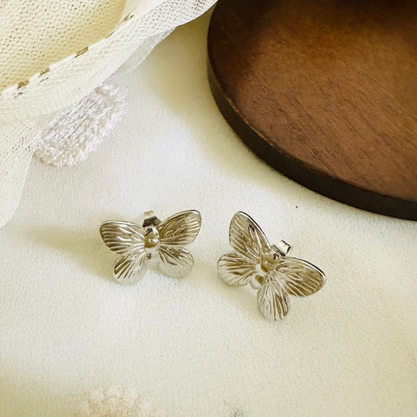 Silver butterfly studs