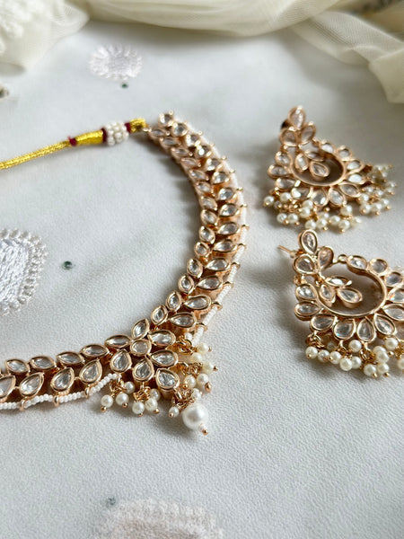 Polki pearl laced leaved short set with chandbali earrings