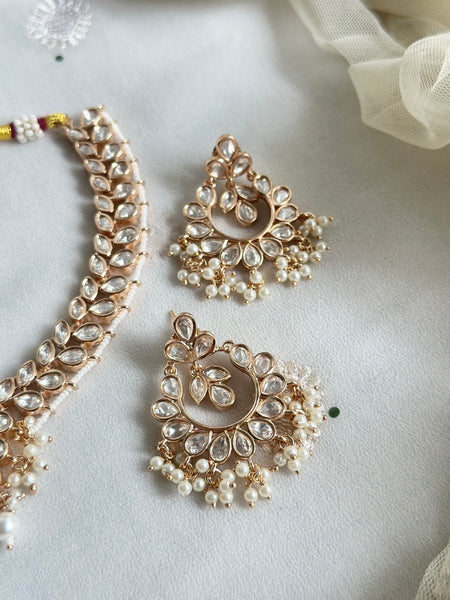 Polki pearl laced leaved short set with chandbali earrings