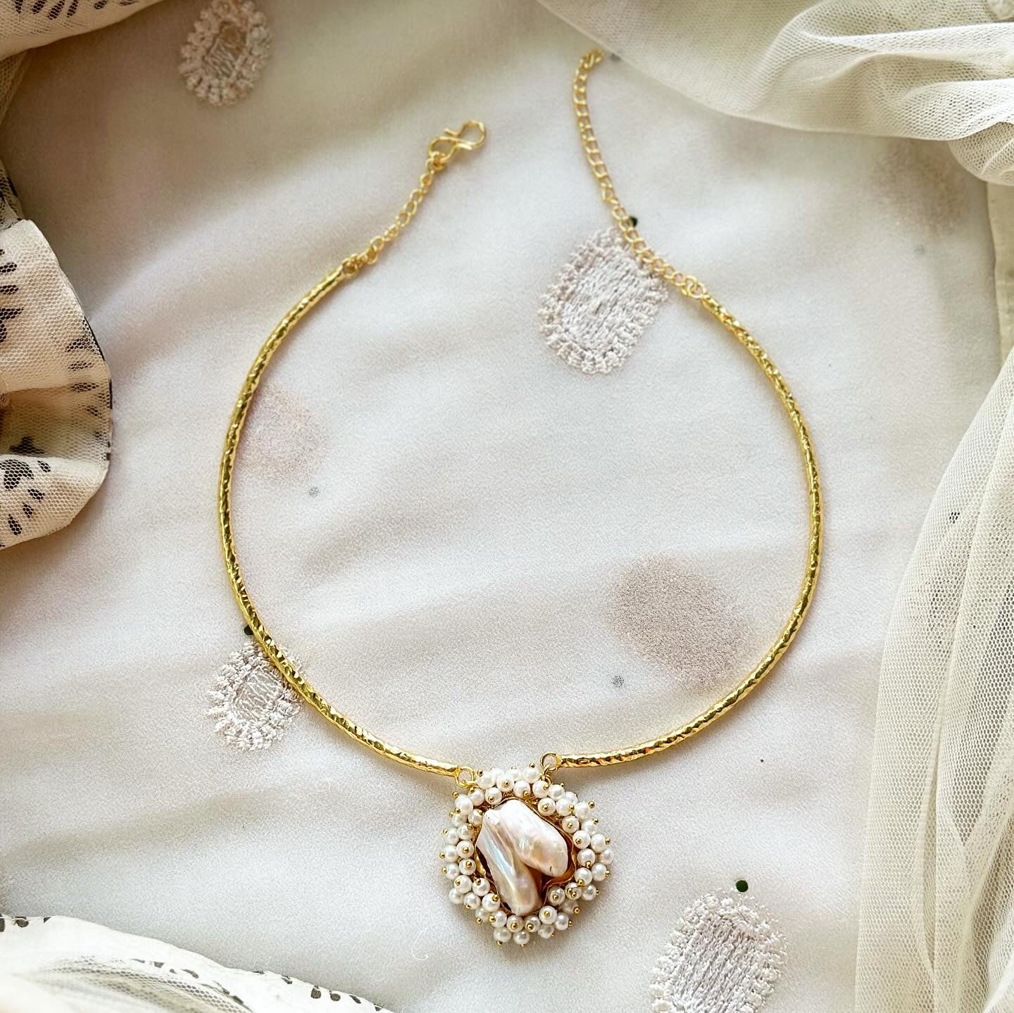 Baroque pearl with beaten pipe neckpiece