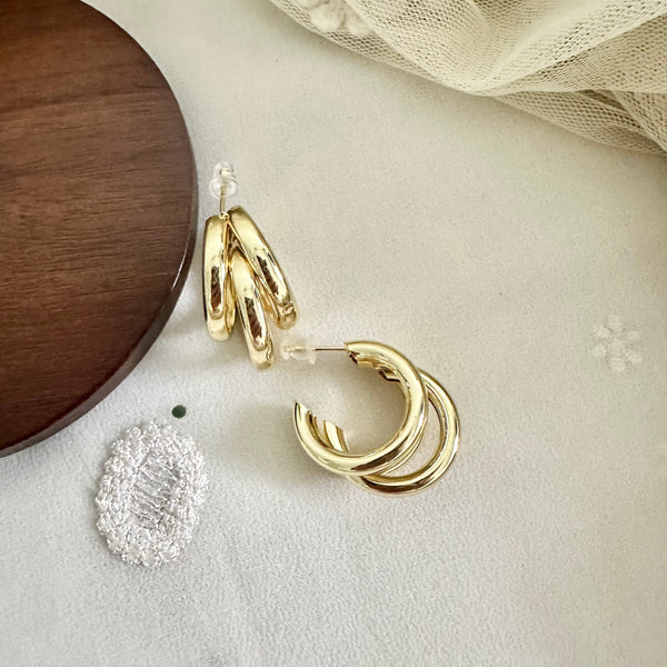 Triple hoops ear studs