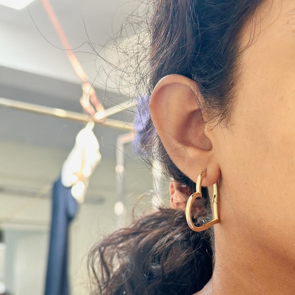 Heart hoop style earrings