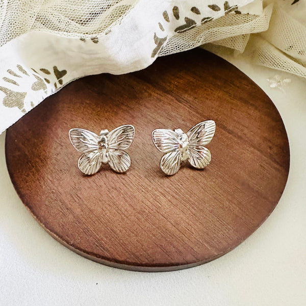 Silver butterfly studs