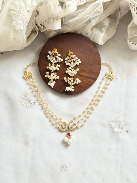 Kundan half moon pearl choker set