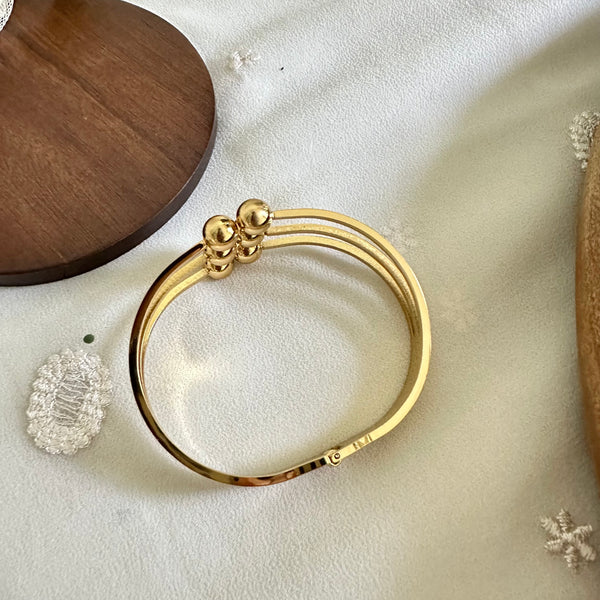 Gold Meeting spheres bracelet