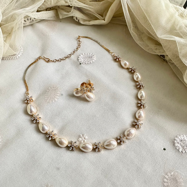 Shiny tear drop pearl CZ flower short set