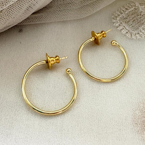 Single hoop style ear studs