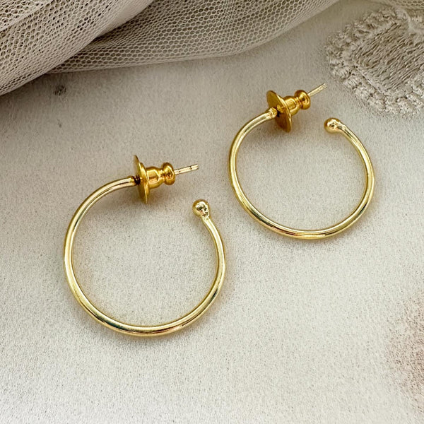 Single hoop style ear studs