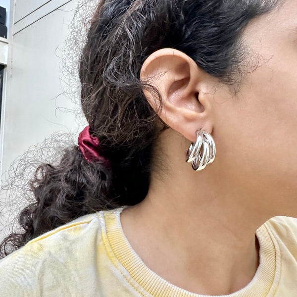Triple hoops ear studs