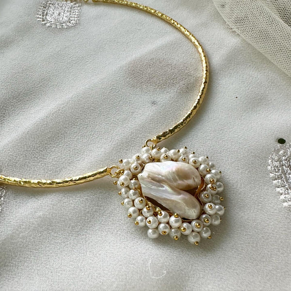 Baroque pearl with beaten pipe neckpiece
