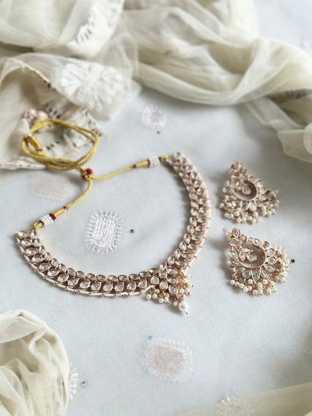 Polki pearl laced leaved short set with chandbali earrings