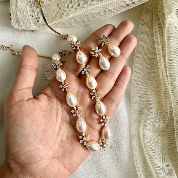 Shiny tear drop pearl CZ flower short set