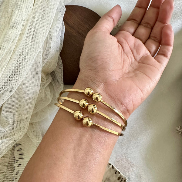 Gold Meeting spheres bracelet