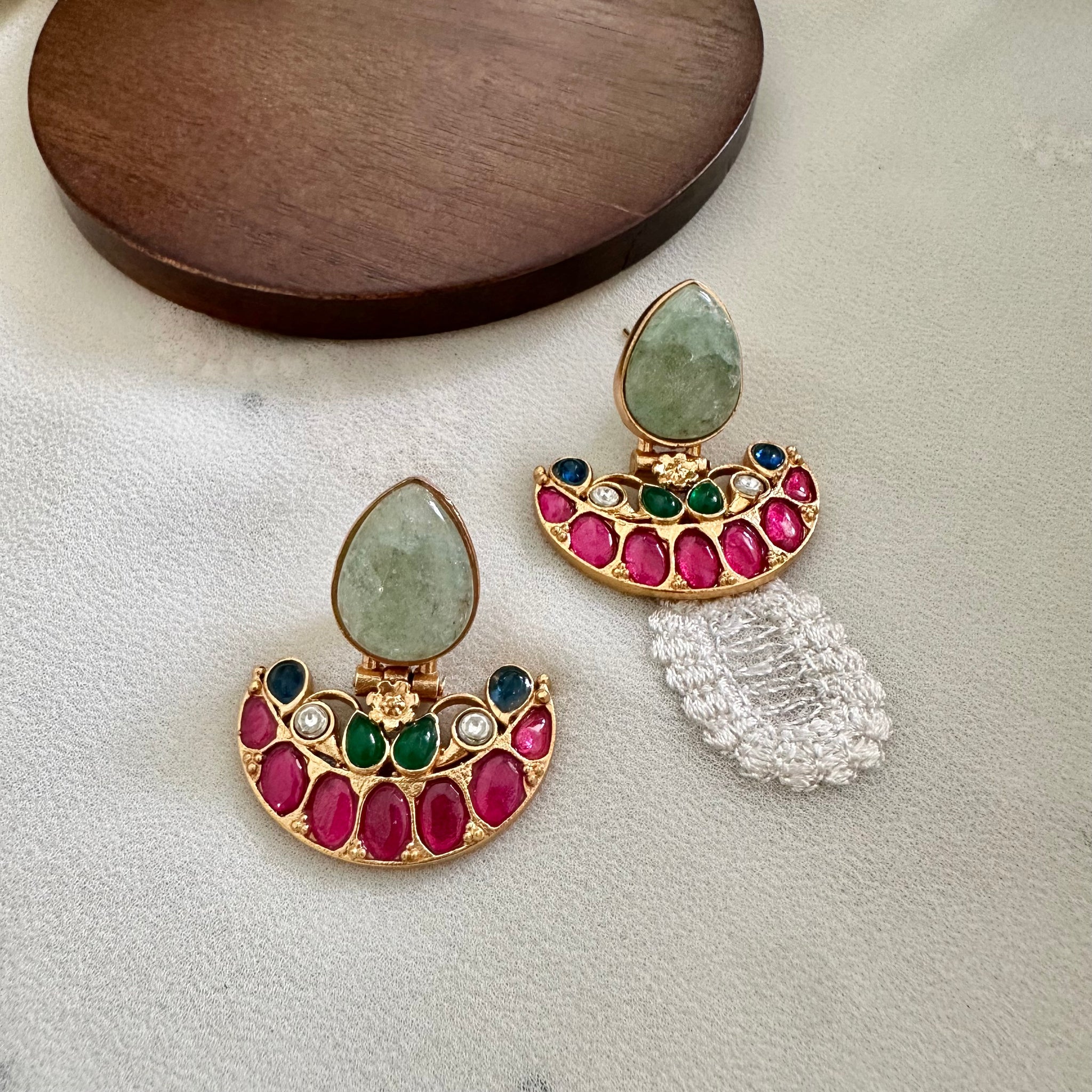 Kundan tear drop smile studs