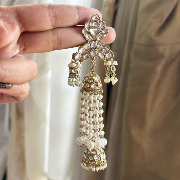 Pearl Jumkhas long earrings