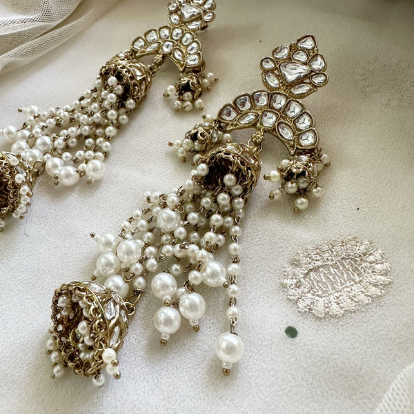 Pearl Jumkhas long earrings