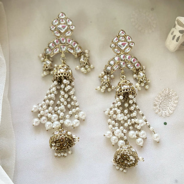 Pearl Jumkhas long earrings