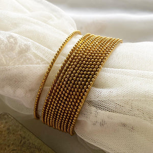 Fancy Gold dotted bangles - set of 12