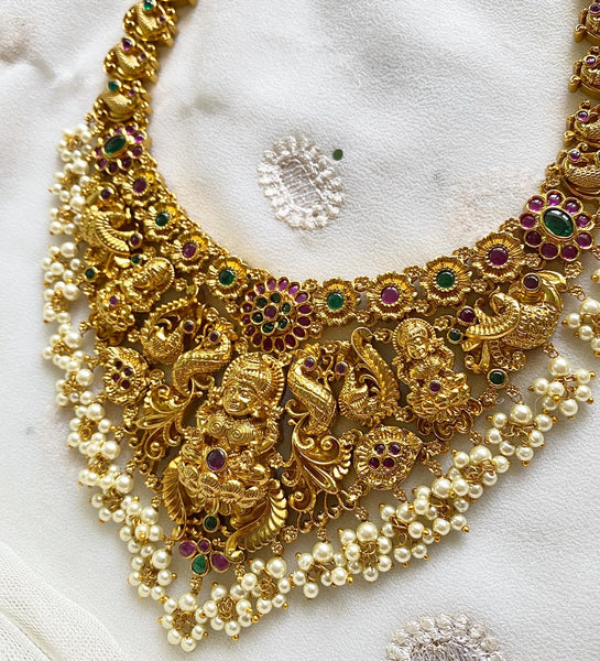 Antique matte kemp studded floral Lakshmi bridal long set