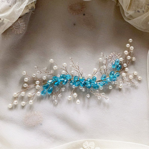 Blue crystal-pearl hair accessory