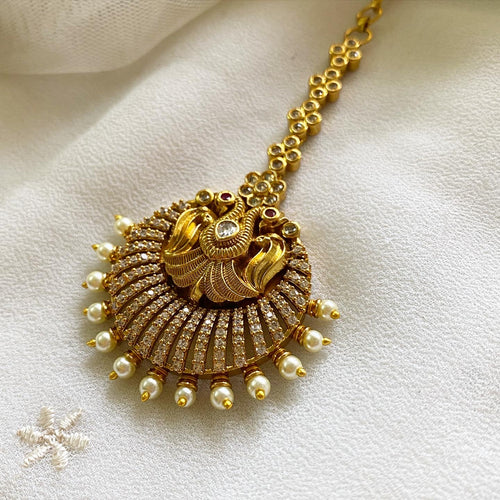 Antique matte CZ Garuda rays tikka - White