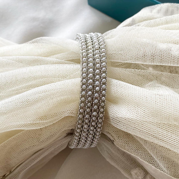 Fancy silver pearl thin bangles - set of 4 - Adorna