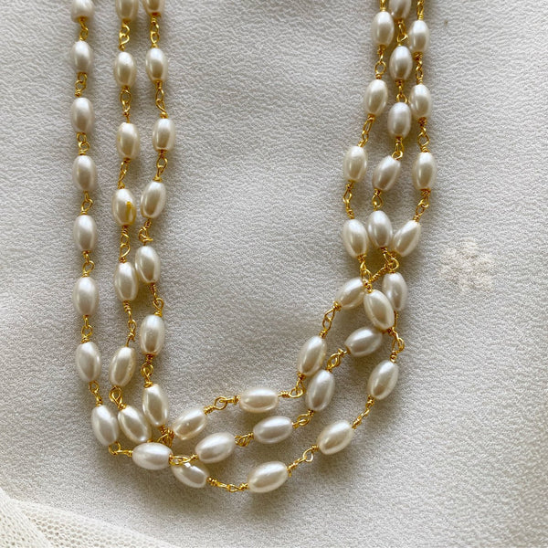 Oval pearl mala - 3 line, 18 inch - Adorna