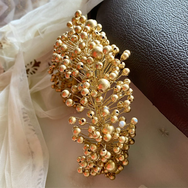 Gold spring dots hair accessory