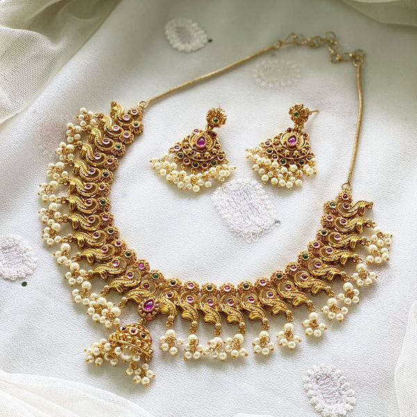Floral swirl short set with half jumkha pendant - Adorna